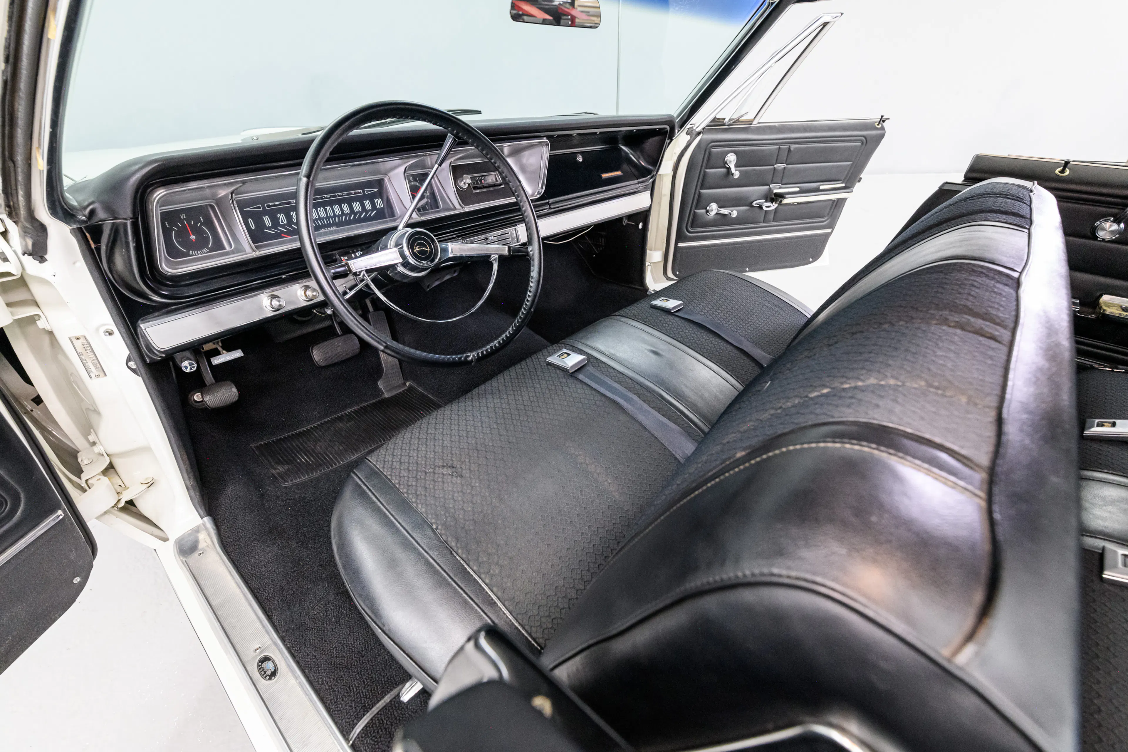 1966 Chevrolet Impala 4dr Sport Sedan Courtesy of AutoBarn Classic Cars