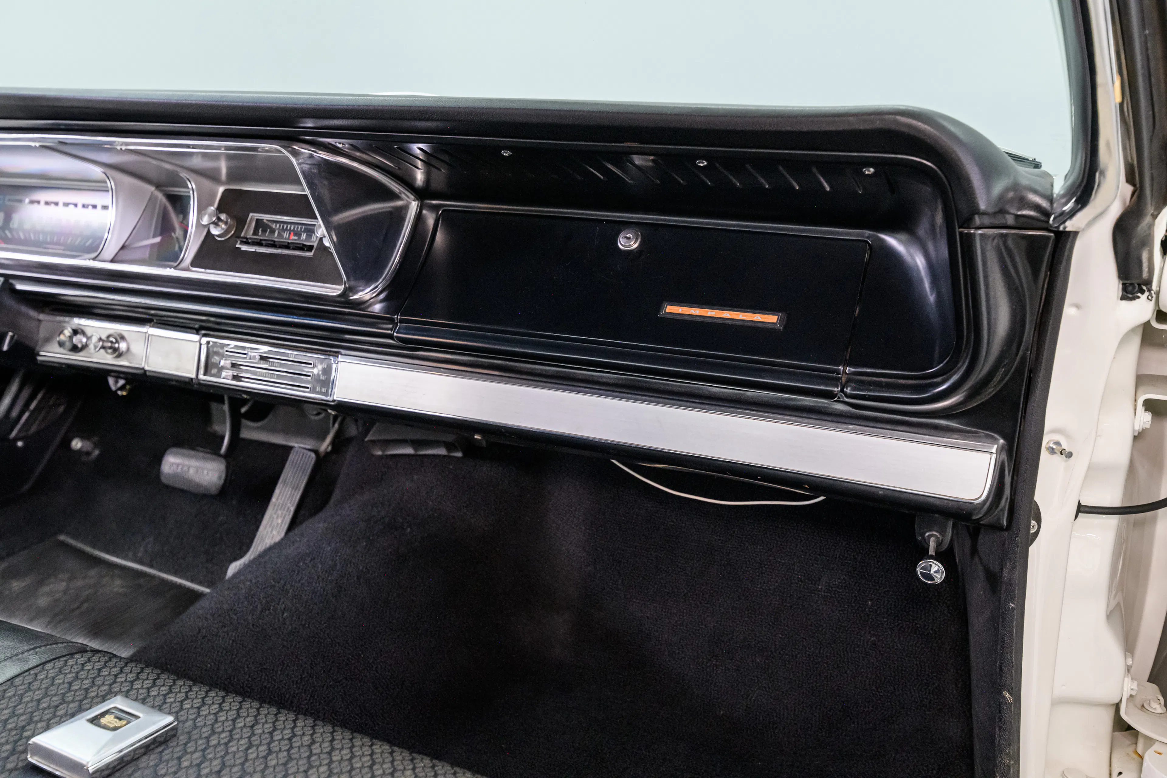 1966 Chevrolet Impala 4dr Sport Sedan Courtesy of AutoBarn Classic Cars