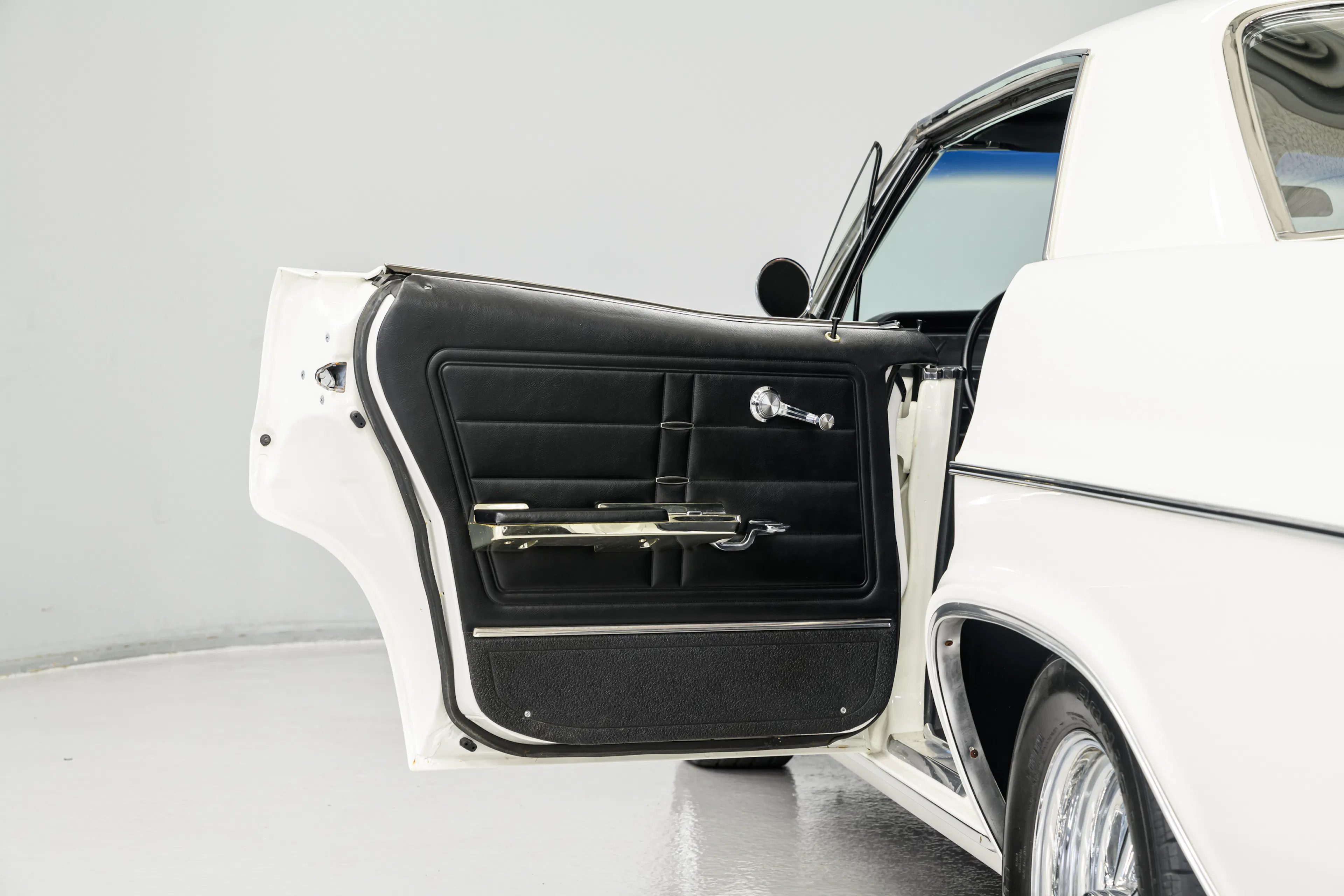 1966 Chevrolet Impala 4dr Sport Sedan Courtesy of AutoBarn Classic Cars