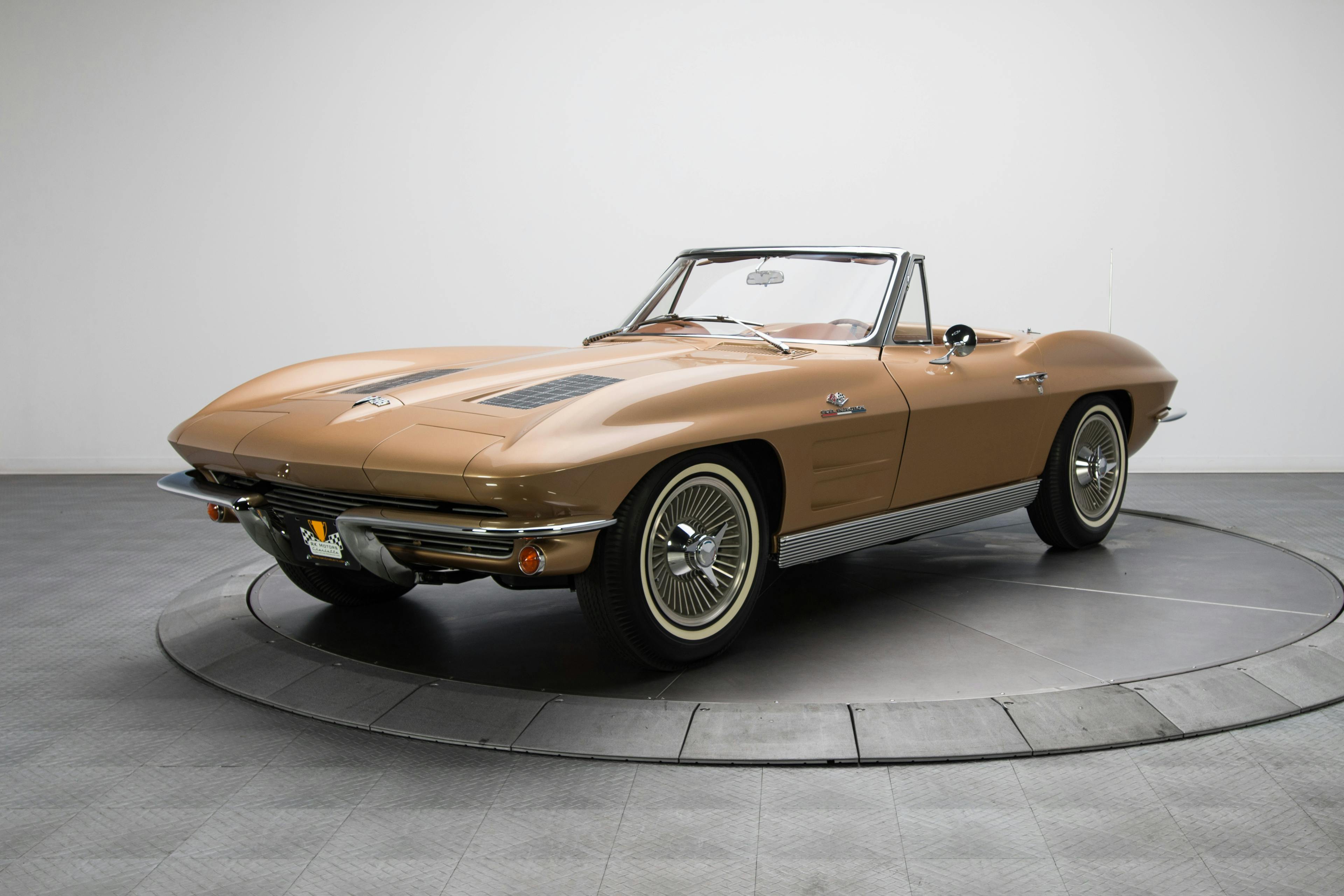 hagerty-vid-images.imgix.net/Vehicle%20Reference%20Data/VRD-80890/1963_Chevrolet_Corvette_Convertible_1.jpg